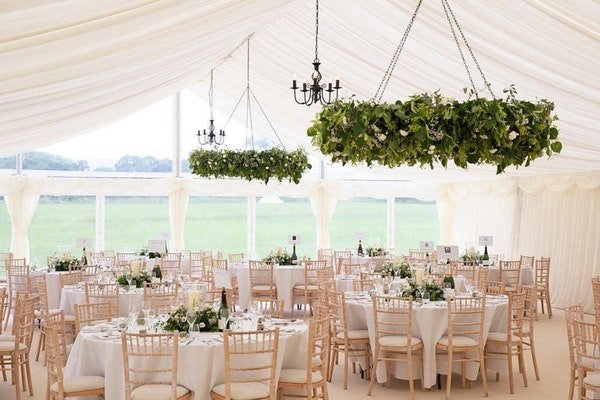 Marquee long trestle with centrepieces Marquee long trestle with centrepieces